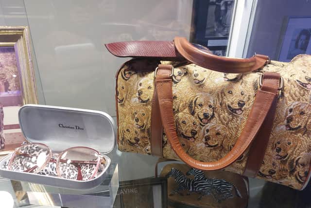 The exhibition features a variety of garments, jewellery and dresses, many of which feature animal motifs.