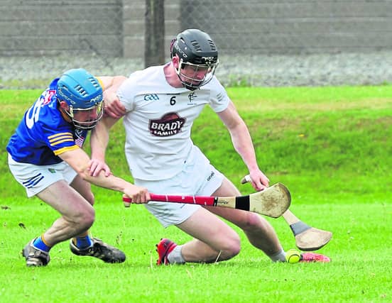 Rian Boran of Kildare wins possession of the sliotar ahead of Wicklow's Kieran Conway. Picture: Sean Brilly