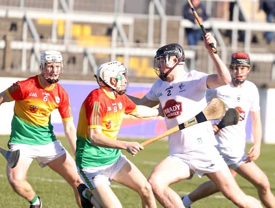 Kildare Paul Dolan cuts inside the cover of Carlow Conor Kehoe during the Allianz National Hurling League Division 2A played at St Conleths Park, Newbridge. Photo: Sean Brilly