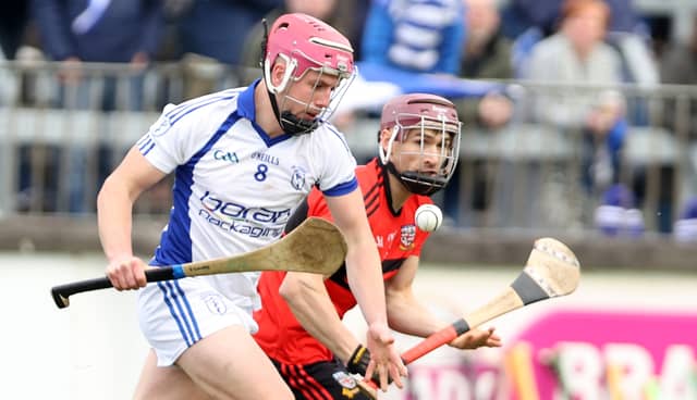 Naas Sean Gainey races clear from the chasing Gerry Keegan Celbridge during the UPMC Senior Hurling Championship Final