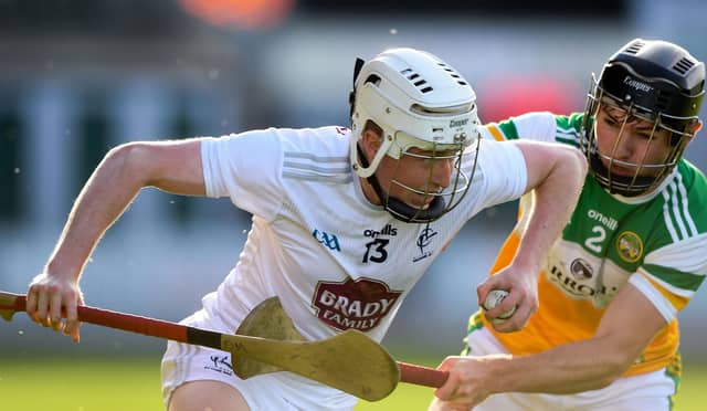 Daragh Melville of Kildare in action against Peter Cleary of Offaly during the Leinster U20 Hurling Championship Quarter-Final match at O'Connor Park in Tullamore, Offaly. P