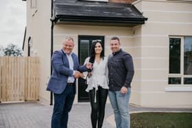 Eugene Finn presents House Winners Aoife O’Malley and James Dooley with the keys to their new home!