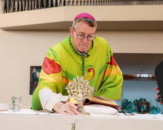 Bishop Denis Nulty holds up the sacred reclic of St Brigid at Kldare Parish Church