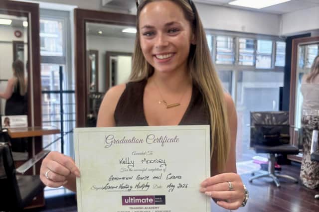 Kelly showing off her top marks