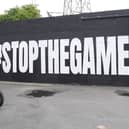 A mural calling for the fixtures to be called off in Dublin