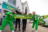 Staff from Centra Clane are joined by The Winnies as they celebrate selling the €500,000 winning ticket