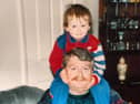 Conor Wynne on his later father Brian's shoulders