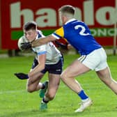 Allenwood Eoin Bagnall dips low to try and avoid the challenge from Dean Cummins Carbury