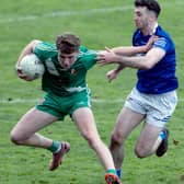 Sarsfields full forward Luke Mahon pushes himself clear of Celbridge Kevin Flynn