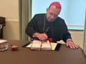 Bishop Tom Deenihan, Bishop of Meath, sealing the official records for the Cause of the Canonisation of Father Willie Doyle SJ 