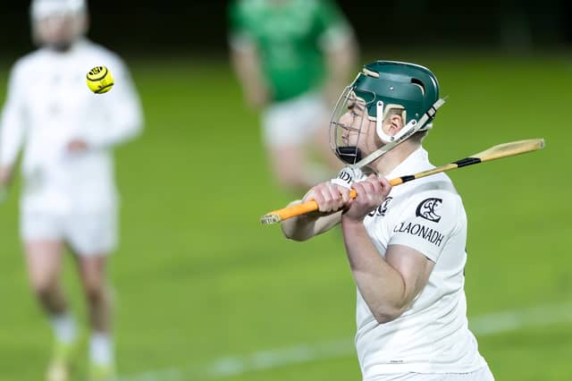 Clane Cormac Vizzard delivers his strike to the inside forward line