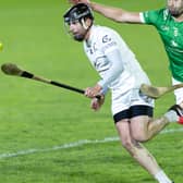 Clane forward Paddy McKenna wins possession ahead of Paul Divilly of Confey