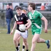 Cathal White of Sarsfields turns outfield away from Darren Maguire of Maynooth in Kildare SFL Division 1 action