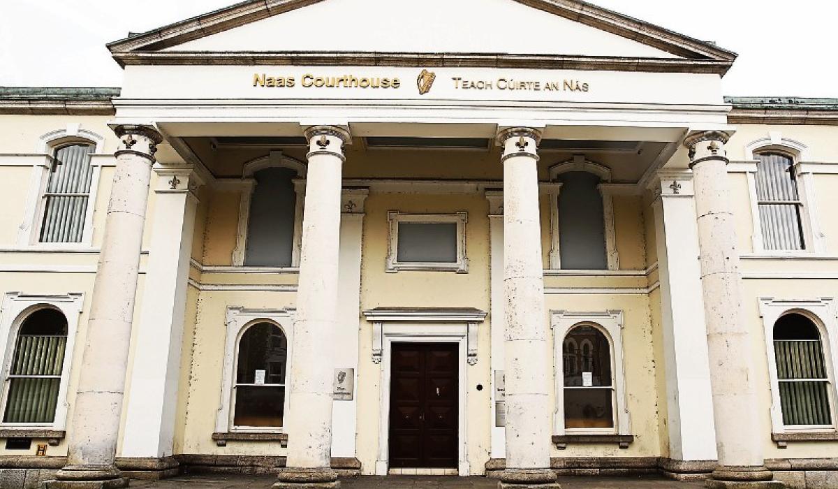 Woman tells court her boyfriend 'threatened her life and kicked hole in