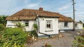 PICTURES: Kildare thatched cottage with original hearth