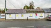 FOR SALE: Adjoining cottages beside Liffey for &euro;150k guide price 