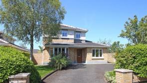 Lovely family home in Naas with sunroom and landscaped gardens on the market for €498K
