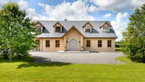 Stunning 4-bed home in Rathangan with detached garage and opportunity to purchase 10 acres  for €465K
