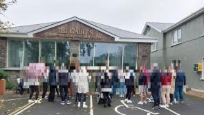 Locals hold meeting outside property in Newbridge, County Kildare where asylum seekers are due to be accommodated 