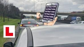 Kildare learner permit driver was holding a mobile phone and  vehicle seized