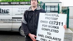 Builder protests outside Gael-Choláiste Chill Dara in Naas, County Kildare