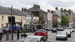Drunk man lying on grass in Naas
