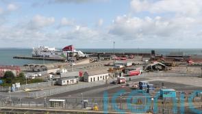 Police investigating after 14 people found in a vehicle at Irish port