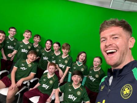 Ireland captain Nathan Collins surprises students from his former primary school in Kildare