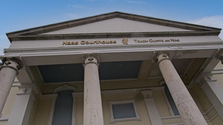 Elderly Kildare man robbed of his late wife's memorial card and up to &euro;9,000 after assault - Kildare court claim