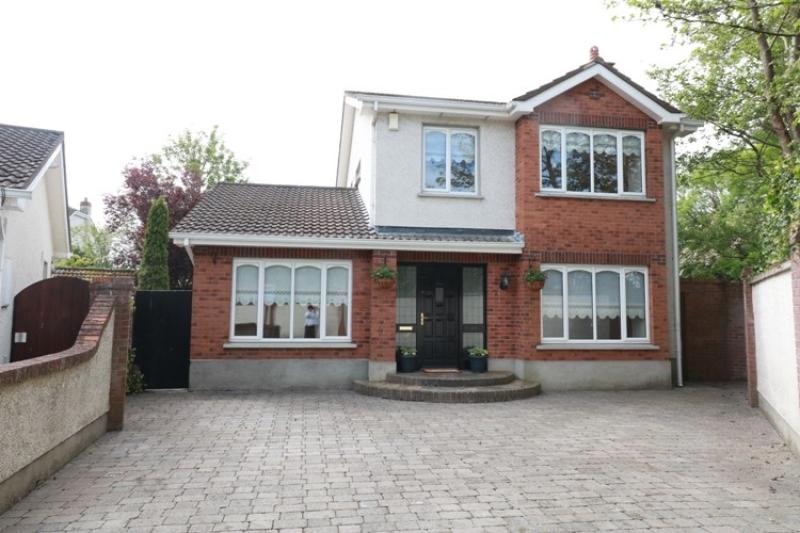 Spacious 5/6-bed home in Newbridge with family room and detached garage for €425K
