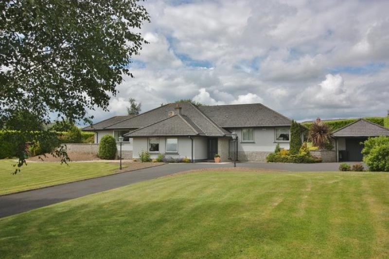 Gorgeous 5-bed home in Two Mile House includes a garage and mature gardens for €695K