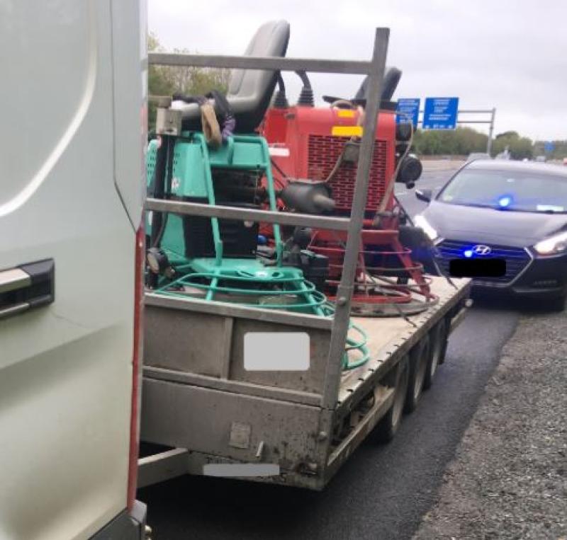 Van towing trailer at over 100km per hour in wet and windy conditions