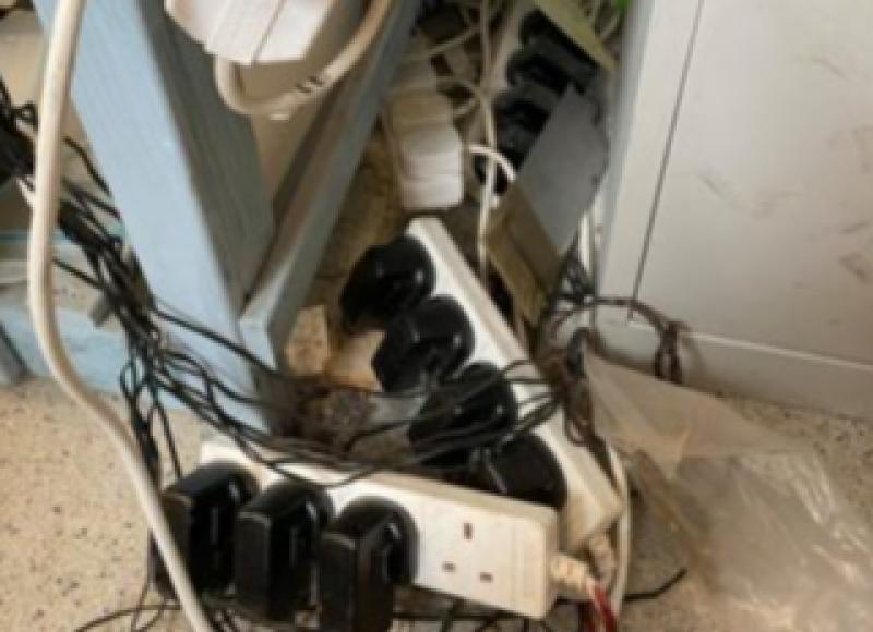 Warning about fire risk of overloaded sockets