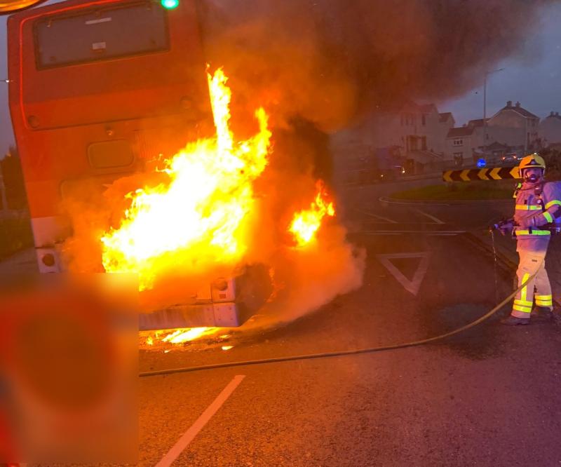 PHOTOS: Fire service battles bus on fire near shopping centre 