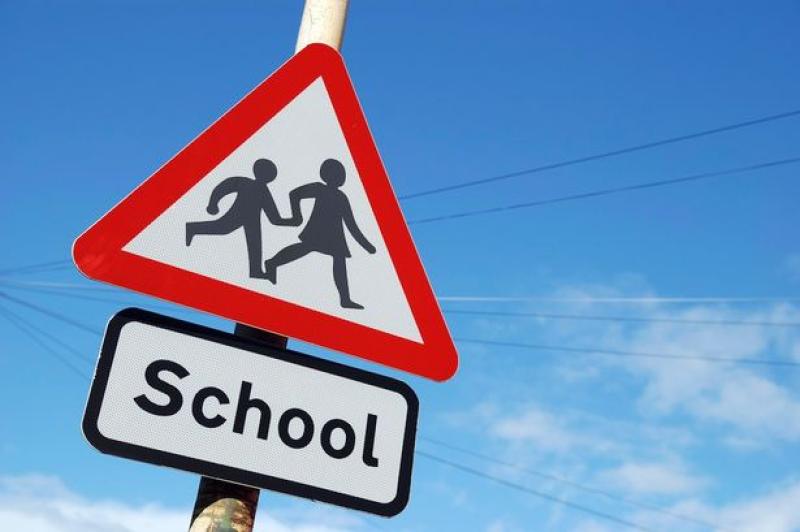 School children crossing sign