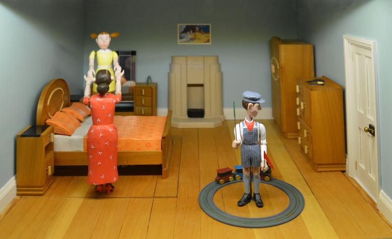 Woman accused of picking up doll house and hitting her ex-partner with it 