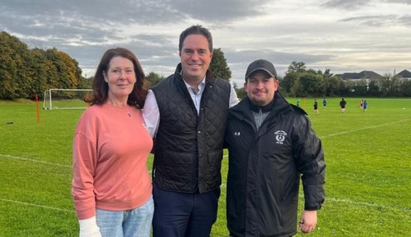 Minister Heydon pictured with representatives from Kildare Town AFC