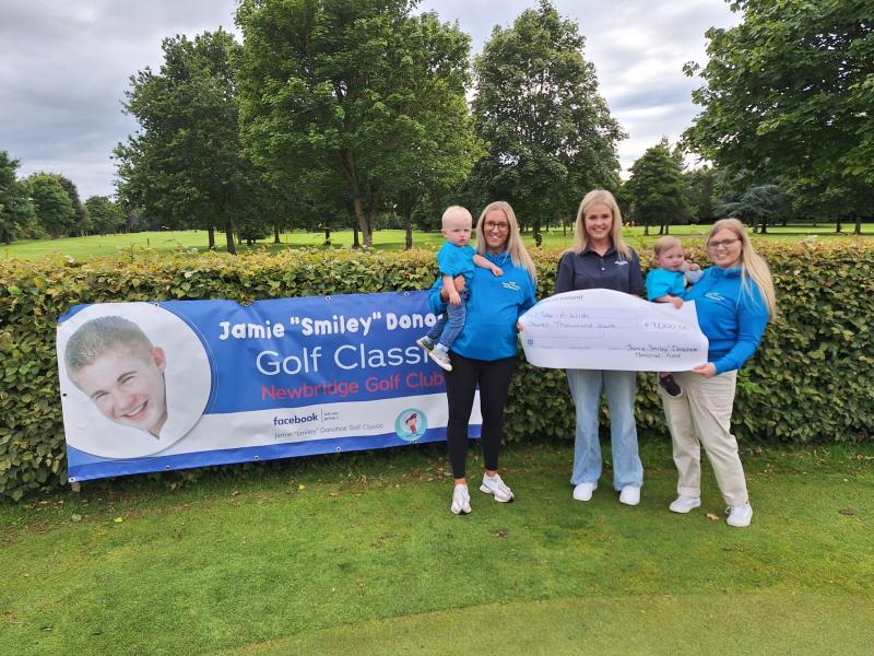 Finn Cullen (Jamie's Nephew), Hayley Donohoe (sister), Emma Hurley (Make A Wish Ireland), Siofra O Sullivan (niece) and  Ciara O Sullivan (sister) pictured at the cheque from 2024 event presentation