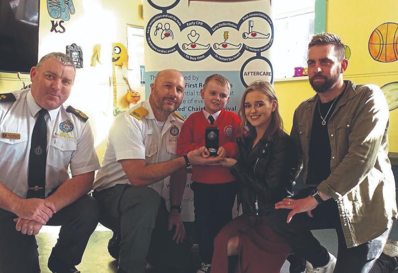Courageous 5-year-old earns medal for saving his mother in medical emergency