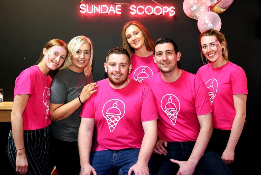 Carl Wilson and Donal McMahon (Owners) celebrate with their staff