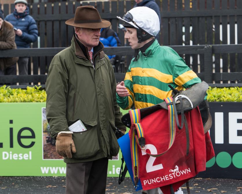 Trainer Willie Mullins and jockey Mark Walsh chat after their success with Blue Sari winner of the Kildare Now Maiden Hurdle, at Punchestown on Sat 16