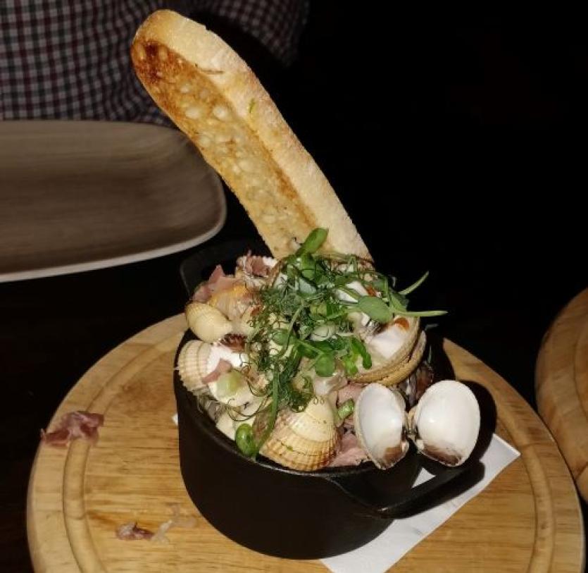Clams and serrano ham served with garlic bread; great infusions here as the clams are cooked in white wine, herbs, cream and a few more flavours