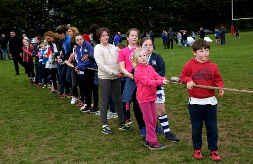 Members of Athy Rugby Club take part in the TUG OF WAR