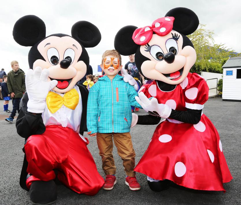 Oliver Kovacik with Mickey and Minnie Mouse