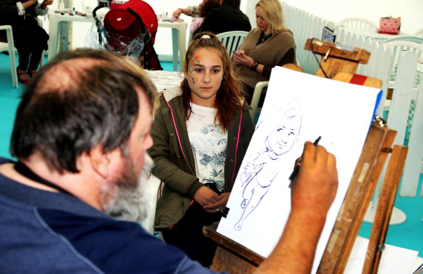 Andrea Turcan gets her portrait done