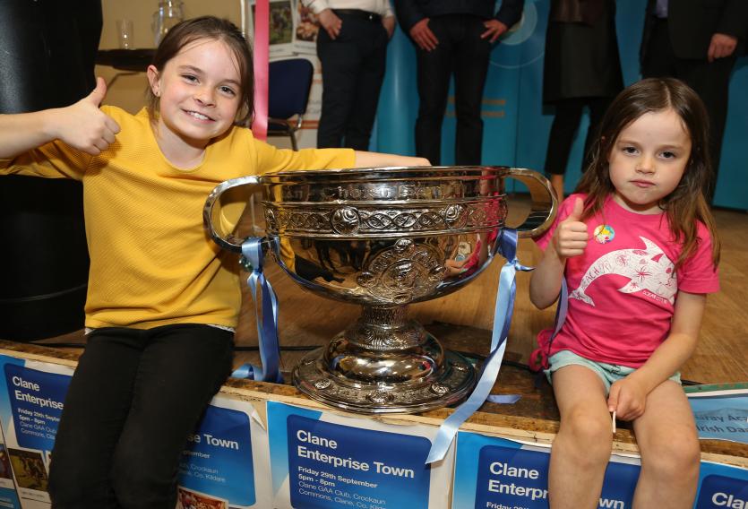Issy and Amelie Wells with the Sam Maguire Cup