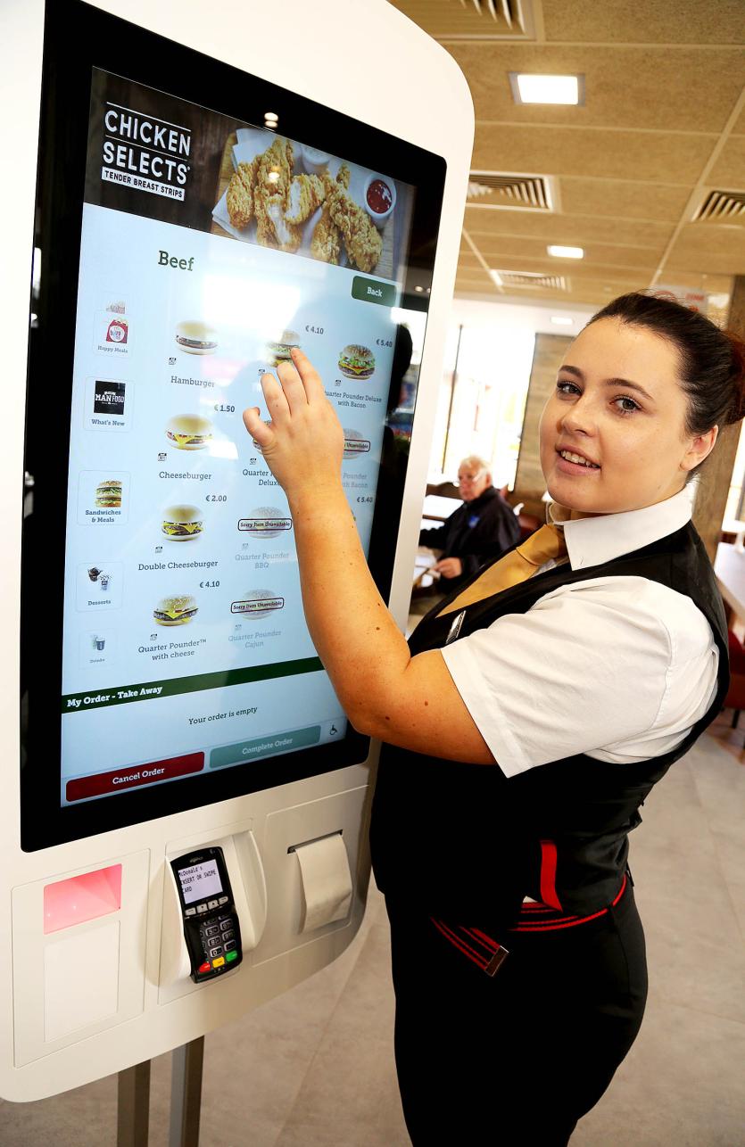 Rachel McNamara orders from the Kiosk