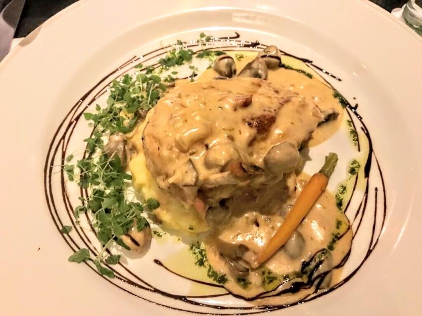 Pan Fried Supreme of Irish Chicken which was served a Velvet Sauce of Marinated Wild Mushrooms, Button Onions and Chorizo Garnish with Soft Herbs