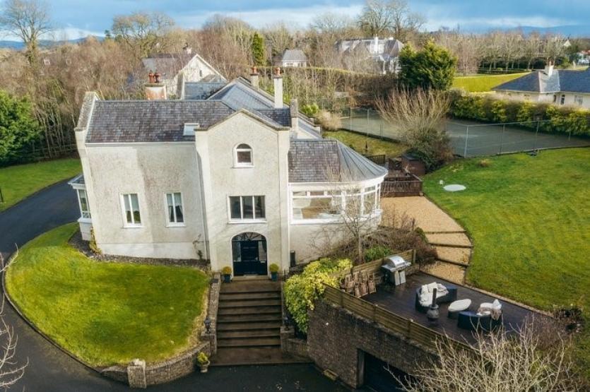 This magnificent home in Two Mile House with sunroom and tennis court is on the market for €