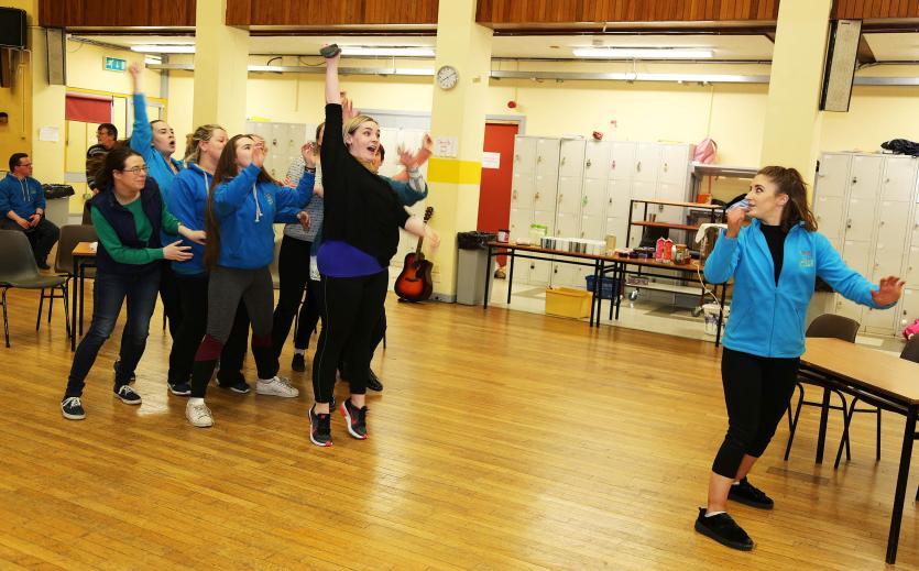 Keelini Kilduff who is playing Julia, catches the bouquet